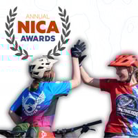 NICA Awards campaign image with two riders high-fiving in front of the NICA Awards logo